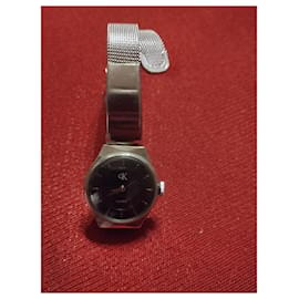 Calvin Klein-Reloj de pulsera analógico vintage para mujer de los años 90.-Plata