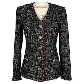 Chanel-Giacca in tweed nero con bottoni gioiello CC leggendari.-Nero