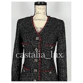 Chanel-Chaqueta de tweed negro con botones de joya CC legendarios.-Negro