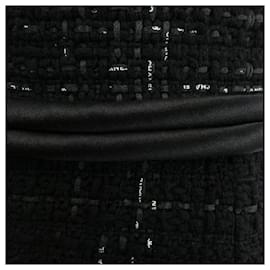 Chanel-Vestido preto de tweed com laço na logo.-Preto