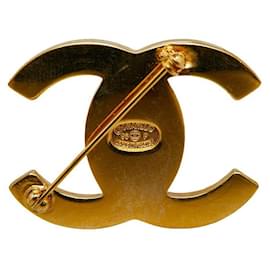 Chanel-Spilla con logo CC Turnlock-D'oro