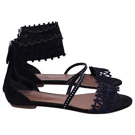 Alaïa Studded Laser-Cut Sandals in Black Suede Black
