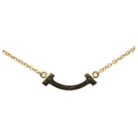 Tiffany & Co-TIFFANY & CO 18Collier pendentif T Smile en or et diamants, collier en métal en excellent état-Autre