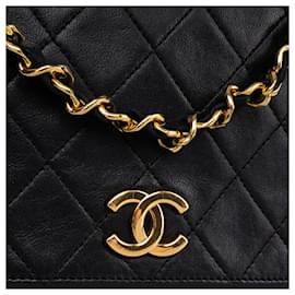 Chanel-Pele de cordeiro acolchoada Chanel 24Bolsa K Gold com aba única-Preto