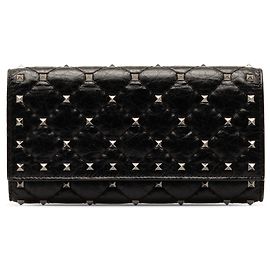 Cartera de cuero con pinchos Rockstud en negro de Valentino Negro