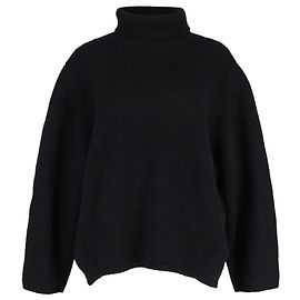 Gerippter Rollkragenpullover von Totême aus schwarzer Wolle. Schwarz