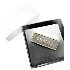 Chanel-Alfinetes e broches CHANEL T.  metal-Dourado