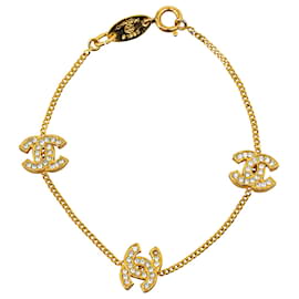 Chanel-Bracciale Chanel in oro con strass CC Station-D'oro