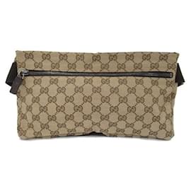 Gucci-Sac ceinture en toile Gucci GG Sac ceinture en toile 28566 en bon état-Autre