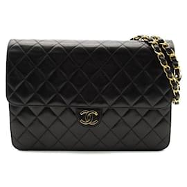 Chanel-Bolso Chanel de cuero acolchado con una sola solapa Bolso bandolera de cuero en buen estado-Otro