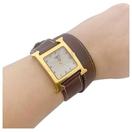 Hermès-Reloj Hermès,"hora", Plato de oro, acero sobre cuero.-Otro