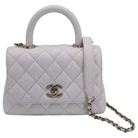 Chanel-Chanel Coco Extra Mini Top Handle in pelle caviale bianca-Bianco,Crudo