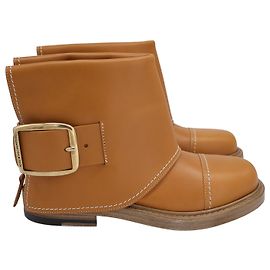 Botas Alexander McQueen em couro marrom Marrom