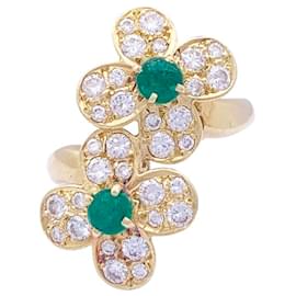 Autre Marque-Van Cleef & Arpels ring, "Fleurette", In yellow gold, diamonds and emeralds.-Other