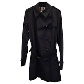 Burberry-Trench coat Burberry in cotone nero con cintura-Nero