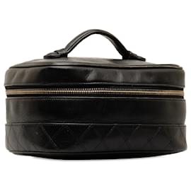 Chanel-Vanity Case Chanel in pelle di agnello nera CC-Nero