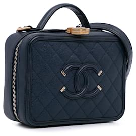 Chanel-Beauty case Chanel in filigrana di caviale blu piccolo-Blu,Blu scuro