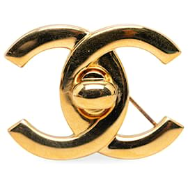 Chanel-Broche à verrouillage tournant CC dorée Chanel-Doré