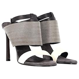 Brunello Cucinelli-Brunello Cucinelli Metallic-Band-Sandalen aus schwarzem und weißem Leder-Schwarz