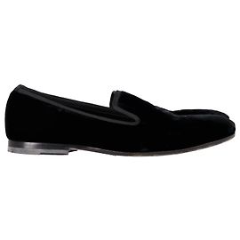 Mocassini Alexander McQueen con ricamo teschio in velluto nero Nero