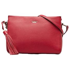 Kate Spade-Sac à bandoulière en cuir avec logo Kate Spade et pompon rouge en très bon état-Rouge