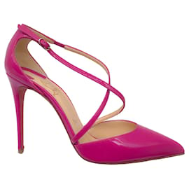 Autre Marque-Christian Louboutin Fuchsia Pointed Toe Patent Leather Cross Strap Pumps-Pink