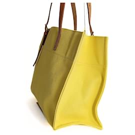 Hermès-Hermès Étrivière shoulder bag in yellow canvas-Yellow