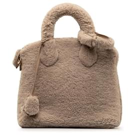 Louis Vuitton-Louis Vuitton Lock It Voyage Canvas Handbag M93850 in good condition-Other