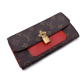Louis Vuitton-Portefeuille long en cuir rouge avec serrure à fleurs en toile monogramme-Marron