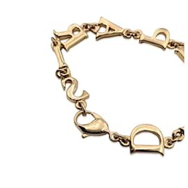 Christian Dior-Pulseira Vintage Gold Spell Out Dior Paris Letter-Dourado