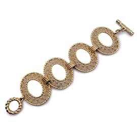 Christian Dior-Pulsera con anillo ovalado de metal dorado vintage-Dorado