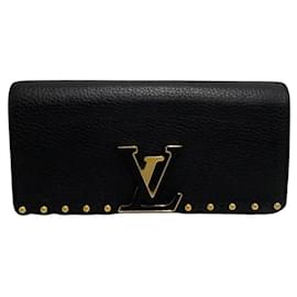 Louis Vuitton-Cartera Louis Vuitton Portefeuille Capucines Cartera larga de piel M64102 en buen estado-Otro