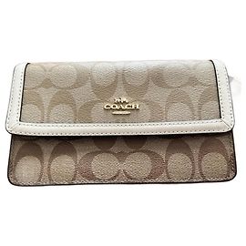 Pochette/ sac coach Beige