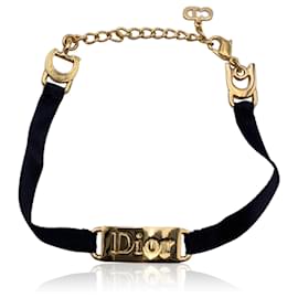 Christian Dior-Pulsera vintage con placa y logotipo de cinta negra de metal dorado-Negro