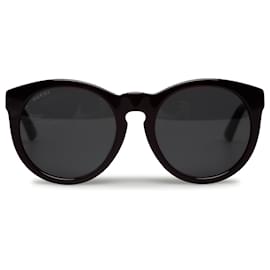 Gucci-Gucci – Runde, getönte Sonnenbrille mit ineinandergreifendem G und schwarzem Stern-Schwarz