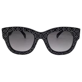 Autre Marque-Alaia Schwarz / Weiße Sonnenbrille mit gemustertem Kunststoffrahmen-Schwarz