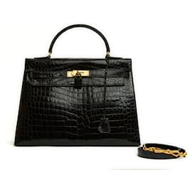 Hermès-1965 Hermes Sac Kelly 32 Precious black Leather Hand bag and strap-Noir