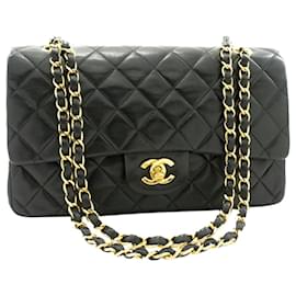 Chanel-Schwarze Farbe 1996-1997 Mittelgroße klassische gefütterte Überschlagtasche-Schwarz