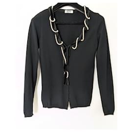 Moschino Cheap And Chic-Moschino Cheap and Chic black cardigan adorned with a white pearl necklace-Black