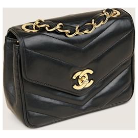 Chanel-Petit sac à rabat à chevrons vintage-Noir