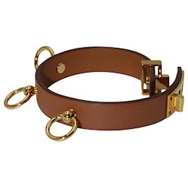 Hermès-Pulsera cruzada Hermès Mini Clous Carres en cuero marrón-Castaño