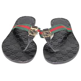 Gucci-Gucci – Flache Zehensandalen mit GG-Webmuster in Schwarz-Schwarz