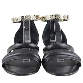 Chanel-Sandales plates à revers de cheville ornées matelassées noires Chanel-Noir