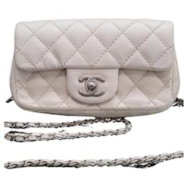 Chanel-Mini borsa Chanel bianca classica con patta trapuntata in caviale-Beige