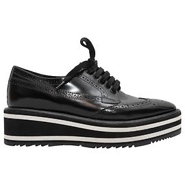 Brogues à plateforme Prada noires et blanches Taille 38 Noir