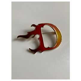 Broche de llama Dior Roja Dorado Amarillo