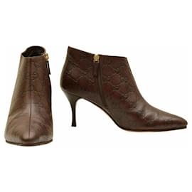Gucci-Botines de tobillo de punta almendrada de cuero marrón estampado Guccissima de GUCCI, talla 38C.-Castaño