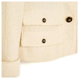 Chanel-Chaqueta de lana bouclé Chanel Veste CC de 1995 en color crema, talla FR38 (equivale a US8).-Crudo