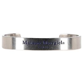 Maison Martin Margiela Bracciale Maison Margiela con logo inciso in metallo argentato Argento