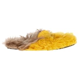 Gucci-Gucci Shearling Horsebit Pantoletten aus gelber und brauner Wolle-Gelb